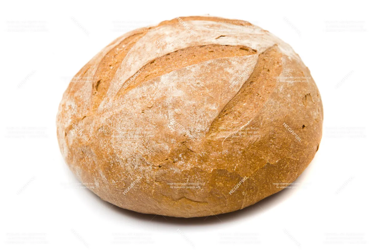 A fresh loaf of bread sits on a wooden board in a cozy kitchen space, suggesting the pleasures of local baking and homemade treats. The lighting and setting evoke warmth and hospitality.